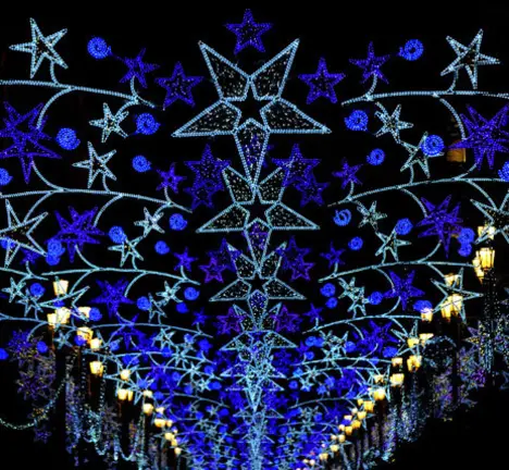 Christmas lights in a street of Sevilla on December 9, 2011. Streets of the capital decorated with lights every year ahead of Christmas celebrations .AFP PHOTO / CRISTINA QUICLER